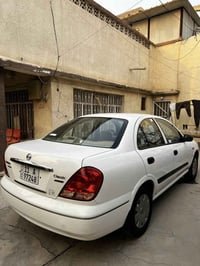 نيسان سني ياباني 2010 سيارة جديدة بمعنى الكلمة تخم تاير وكهربائيات كله...