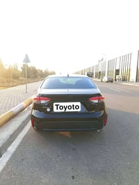 کرۆلا امریکی 2021 مواسفات LE تەنها دەعامێکانی بۆیاخە 94هەزار ڕۆشتوە ڕە...