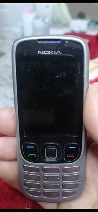 نوكيا اصلي • شغال • مع شاحن