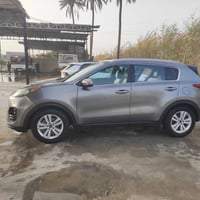 كيا سبورتج 18امريكي ضربه قليل جاملغ وربع بنيد بدون ضرر مكينه 2400جي دي...