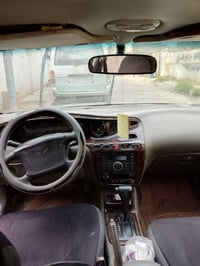 رقم بغداد • ١٩٩٨ • ماكينة وقير كفالة