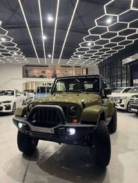 جيب رانكلر خليجيه   2013  اصل صحارى  ماشيه 67الف كيلو   رقم بغداد مميز...