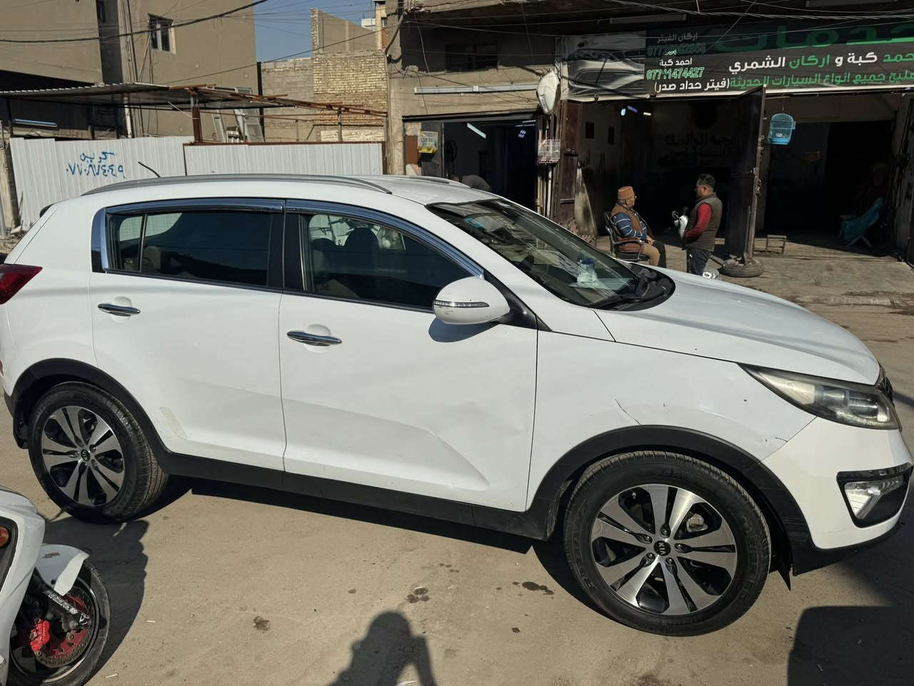 سبورتج 2014 خليجي 
بيهة بنيد مصبوغ نصة وبيهة جاملغ مبدل والاصلي جاملغ موجود بي طخة خفيفة 
وبيهة بارد مثل مموضح بالصور 
سيارة تخم تاير
 ماشية 170 
مري شفط محرك 2000 دوش
للاستفسار ***********
بغداد الاعظمية 
السعر 143 وبيهة مجال
