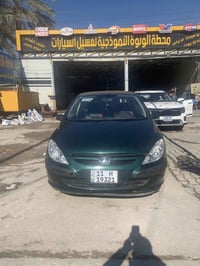 بيجو ٣٠٧ • كير ومحرك مكفولة • بغداد