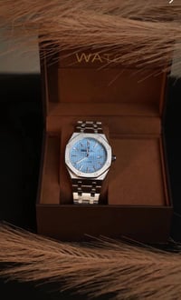 ساعه رجالي • اي بي • ضمان سنه