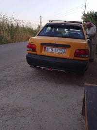 سايبه 2012 رقم انكليزي سنويه جديد مصفره  تخم تاير صدر السياره نضيفه تب...