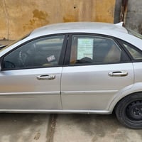 فورنزا 2007 رقم بغداد السياره بأسمي تحويل ثاني يوم  مكينه 2.0 كير اوتو...