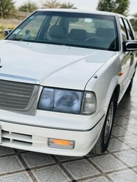 للبيع سيارة سترك نيسان كامل موصفات رقم بغداد موديل 2001 تفاصل باقي الس...