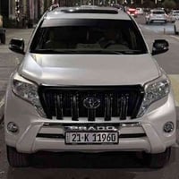 تۆیۆتا پڕادۆ 2014 مواسەفات TX.L 4V ٢١٥ هەزار ڕۆشتوە  ناو زەرد  تایە لە...