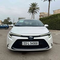 كورلا هايبرد شكل الأمريكي 2024 فول مواصفات ☑️ بصمة تشغيل وابواب / فتحة...