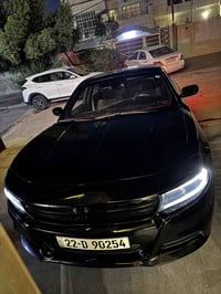 جارجر sxt مديل2022 أصل لون اسود ماشية 63الف ميل مواصفات كامرة خلفية حس...