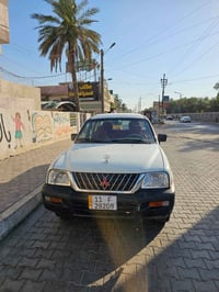 بيكب ميتسوبيشي موديل 2004 سيارة نظيفة محرك وكير وحدادية نظيفة رقم بغدا...