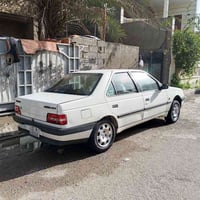 بيجو 405 • رقم بغداد دولي • قير ومكينة بضمان