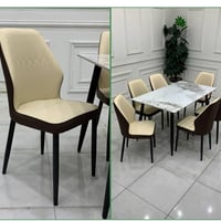 ميز طعام • ٦ كرسي • كشنات جلد