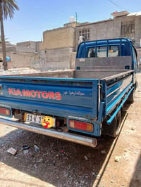 كيه ام عيون 2004 سيارة حلوه مكفوله بس دوس بيه صبغ لباقي مكفول رقم بغدا...