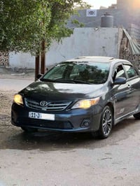 كورلا موديل 2009 فول XRS فتحه تحكم ستيرا اربع جهات شاشا كبيره كامره حس...