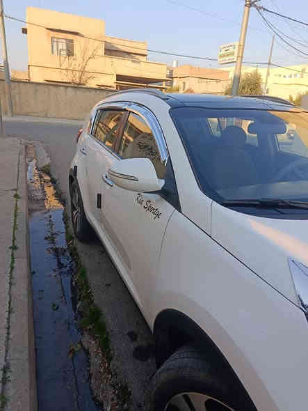 سيورتج 2011.. السعر.130..صبغ احزام..بدون دواخل..محرك 20.خليجي..رقم اربيل سنويه جديدة.. بسمي
