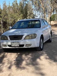 شيري  A ستار ٢٠١١ اللون ابيض بغداد محرك وكير كورلا vvtz1 محرك وكير صار...