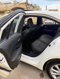 كورلا هايبرد 2025 رقم وسنويه بغداد الجديد كفاله عامه السياره بصمه ماشي...