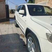 جيب شيروكي البيع مديل 2011 مكينه حداديه طخم تاير تبريد شغال  رقم بغداد...