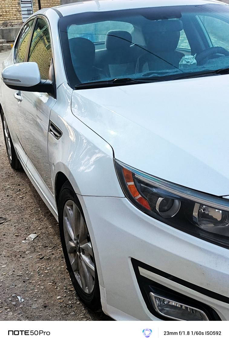 كيا اوبتيما 2015 حره ابيض وارد امريكي  gdi سياره جديده سعرها 117 ورقه تغليف جلد  تبديل بنيد وصبغ جاملغ بدون ايرباك للاستفسار *********** الشطره, ذي قار
