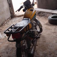 دراجه البيع نامه مكينه رابيدو ما مفتوحه حلوه نضيفه شراي هاذه رقم 07875...