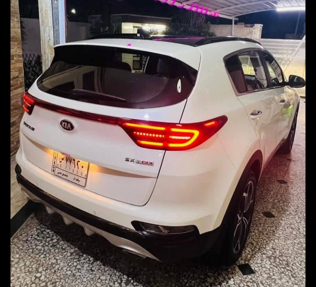 ‏Kia Sportage SXL 2000 Turbo 2021   سبورتج 2021 وارد امريكي لون ابيض رقم بغداد حرة باسمي  السيارة اني مستوردها ع ايدي حادثها تبديل جاملغ وبنيد ايرباك ستيرن فقط ماشية تقريبا 83 الف ميل السيارة فووووول مواصفات 1/1 فئة SXL    مواصفاتها  محرك 2000 تيربو دبل كزوز   / سقف بانوراما قطعتين / بصمه ابواب و تشغيل و صندوق / ستيرن حرف دي تحكم ستيرن كامل / تبريد امامي خلفي / شحن لاسلكي / كشنات جلد لونين كريمي واسود + الاماميات كهرباء تدفئة وتبريد / تدفئة استيرن / انارة داخلية لد / رادار امامي + جانبي مرآة + خلفي  / لايتات زينون عالي ناصي + بك لايت لد / سيتم سماعات 10 سماعة هارمن كاردن صوت مرعب  / سايد بريك كهربائي (بصمه) / اوتو هولد / شفتات ستيرن / شاشة كبيرة بلادية / اشاير مرايات جانبية + شفط  /ويل 19 بلادي كروم / رادار خروج عن المسار  ...  وبعد هواي بيها مواصفات    رايدها 167$وبيه مجال للشراي غير متواجد ع الفيس للاستفسار الاتصال ***********
