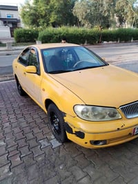 نيسان سني ياباني موديل 2009 وراد ياباني سياره مكفوله من من حادث والمعج...