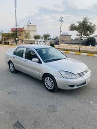 لانسر • ٢٠١١ • توماتيك