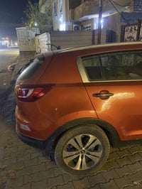 سياره سبورتج عاليه 2014 للبيع مكفوله كفاله عامه  07700418837