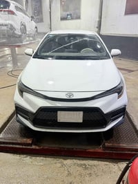 � تويوتا كورولا 2022 – SE سبورت ✔️ ماشيه: 9,000 كم فقط ✔️ محرك 2.0 لتر...