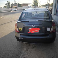 سيارة اكسينت وارد امريكي موديل 2008 اللون رصاصي محرك 1600 دوش رقم بغدا...