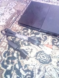 بلاي ستيشن ٢ • شغال • ملحقاته كاملة
