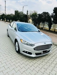 فۆرد فیوجن نیڤا ۲٠۱٤ بێ بۆیاغ یەک بست ساردی هەیە کۆدی دەرگا و سێ شاشە ...