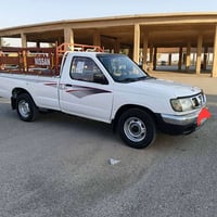 نيسان بيكاب • ٢٠٠٢ • كويسينجاك