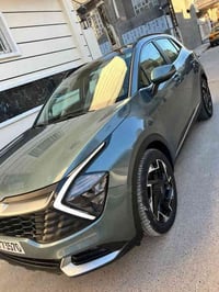 كيا سبورتج 2023 فول 1/1 مواصفات جي تي لاين لون مميز زيتوني متغير  المو...