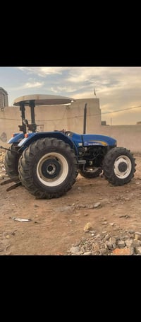 مكينة نيهولند حجم 80 م 2011 لبيع السعر 20 ,وهاذ رقمي 07818087121