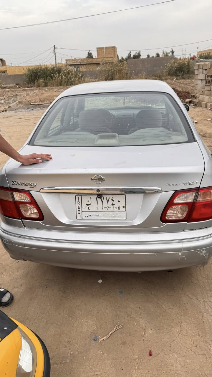 نيسان سني موديل 2000  محورة بيه قطعتين صبغ  مكاني كوت ***********
