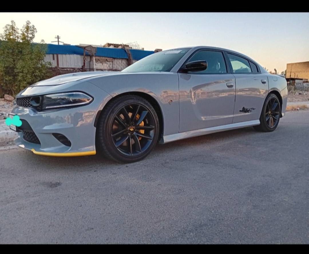 دوج جارجر  ::GT:: سوبر تراك
الموديل :2022
اللون : سموك
العداد : 42 ::
المحرك : V6.  3.6L .

الحادث : موضح بل صور فقط صبغ دعاميتين   بيها طخه شطح بل براكيت مال دعاميه الاماميه. وراجع بارد حادث امريكه الدعاميه   الخلفيه فاتحيها  بامريكه   وبك لايت بلادي اجه ويها بيها ثلاث اربلكات لان لابسين حزلم. راديترات وغاز تبريد بلادي شركه تبريد ثلج  :::

رقم صاحب السيارة ☎️   ***********

المواصفات : السياره فول 1/1 عدئ فتحه 
* مكابح رياضية برمبو اصليه  مع دبلات لون
اصفر . SRT مع كت كامل SRT
شوته رياضي
* ويل قياس 20 انچ اسود . 
بيها صوت  بل اكزوز يختلف عن العاديه: :::
* ستيرن رياضي D . 
* مقاعد رياضية من الجلد والشامو(كنتاره)
* رادار نقطة عمياء + لد ترحيب . 
* مصابيح أمامية اصفر  . 
* كشافات الضباب زنون . 
* المصابيح الأمامية عليها متغير مع اشاره اللد الاصفر الشكل الجديد :::
* الشاشة مع اوپشنات SRT . مع كار بلي 
* سستم صوت الپاين  .
* مقاعد أمامية كهربائية عدد 2 . 
* ذاكرة لحفظ وضعيات الجلوس (ميموري) . 
* مقاعد أمامية تبريد وتدفئة . 
* مقاعد خلفية تدفئة . 
* تشغيل عن بعد . 
* ستيرن كهربائي . 
* تدفئة ستيرن .  
* مرايا متحسسة للاضاءة العالية الوسطيه وجهة السايق.
* كير شفتر بالستيرن .
*تحكم ستيرت كهربائ
*بيها جهاز انتذار مشدور من امريكه
*كامره  دواره 
*مكان سياره بغداد.
