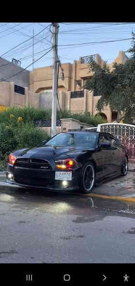 جارجر 2014  ار تي  فول  مواصفات لأخير  حادث جاملغ جهت السايق  بدون ايرباك او لغد او شاصي  السياره فول تزود من هوائيات وشوته رياضي وبنيد ابو الفتحه،? المكان بغداد الرقم ***********  رقم  بغداد تحويل مبآشر السعر 150$ وبيها مجال السياره نظيفه بدون اي نقص بغداد
