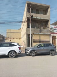 الاستثمار • بناية • شقتين ومحل