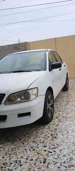 السلام عليكم لانسر 2002 رقم بغداد مجدده ل30 السياره نضيفه وحلوه بلاديه السونار مرافق مع الصور السعر (60) وبيها مجال مكان السياره بغداد رقم الهاتف:***********
