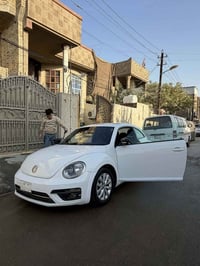 للبيع بيتل موديل 2019 وارد امريكي رقم بغداد مشروع وطني  لون ابيض  مواص...