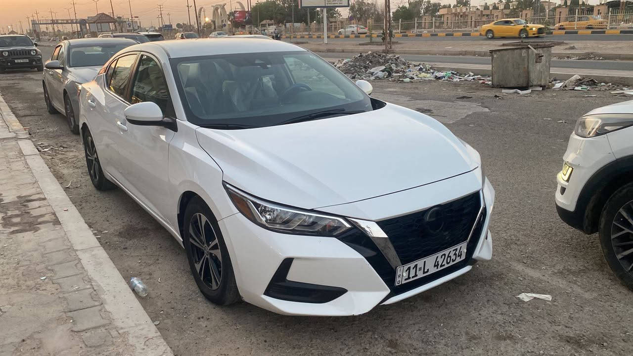 نيسان سينترا SV Plus 2023*
مواصفات أمريكية 

*التفاصيل:*
- *الموديل*: 2023
- *اللون*: ابيض لؤلؤي
- *المحرك*: 2.0 لتر 4 سلندر اقتصادي
- *الكير*: اوتوماتيك CVT
- *الممشى*: 70,000 كم فقط
- *الرقم*: بغداد
- *المكان*: الديوانية

المواصفات 

*الأمان والراحة:*
- شاشة 8 انج لمس + Apple CarPlay + Android Auto لاسلكي
- كاميرا خلفية 
- حساسات خلفية
- رادار أمامي + نظام الفرملة الطارئة
- مثبت سرعة "كروز"
- بصمة تشغيل + بصمة أبواب
- تشغيل عن بعد
- 6 ايرباك
- حساسات ضغط الإطارات

*الداخل والخارج:*
- مقاعد قماش مميزة لفئة SV Plus
- تحكم ستيرن كامل
- تبريد لمس شاشة
-  لايت نهاري اوتو 
- جنط 16 انش ألمنيوم
- مرايا كهرباء + تدفئة

*المواصفات:*
- اللون: ابيض
- المحرك: 2000cc - 4 سلندر
- الكير: اوتوماتيك CVT
- الممشى: 70 ألف كم
- الرقم: بغداد
- المكان: الديوانية
 SV Plus 
شاشة، كاميرا خلفية، حساسات، رادار، بصمة، تشغيل عن بعد، كروز، كاربلاي لاسلكي، 6 ايرباك، جنط 16

*السعر: 140 ورقة* ***********

سيارة نظيفة واقتصادية بالبنزين، مناسبة للعائلة والدوام.

*السعر المطلوب: 140$ ورقة*
قابلة للتفاوض للشراي
