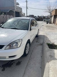 لانسر • ٢٠١١ • مكينة كبيرة