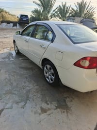 اوبتيما • ٦ سلندر • زنون