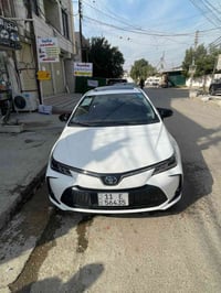 كورلا شكل خليجي موديل 2023 علامه زركه باب اول داخل احمر ماشيه 35 سياره...