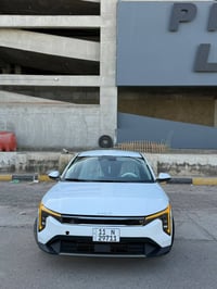 (كيا K4 2025 EX) رقم بغداد بأسمي  حادثها تبديل بنيد فقط  صور الحادث با...