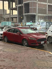 فورد فيوجن ٢٠١٤ السيارة كير ومكينة بشرط سيارة بيت بيها ضربة بجاملغ ولب...