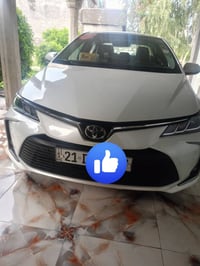 كورلا 21مكفوله عدا  بارد حك اصبع بالباب الي عكس السايق بصمه  سياره جدي...